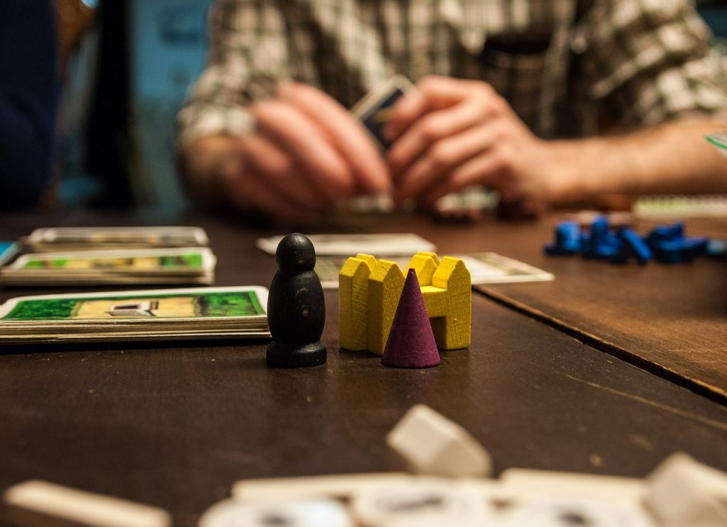 Young people playing board games